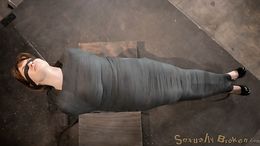 Fully wrapped mademoiselle and her free mouth