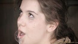 Blindfolded teen in blue dress sucks a dick with tied hands