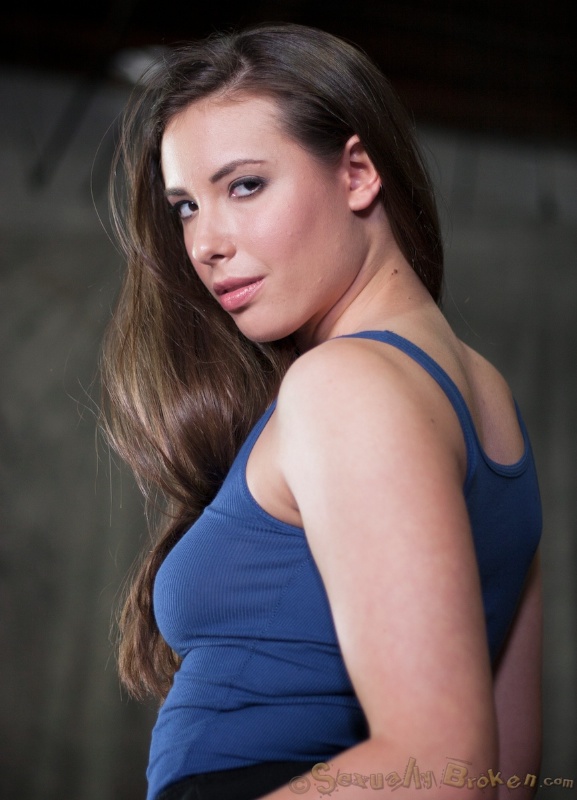 Lass hangs upside down and submissive sucks her master