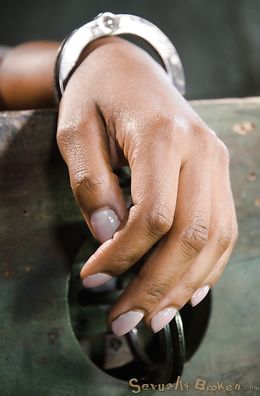 Cuffed Asian doll submissively sucks a white dick