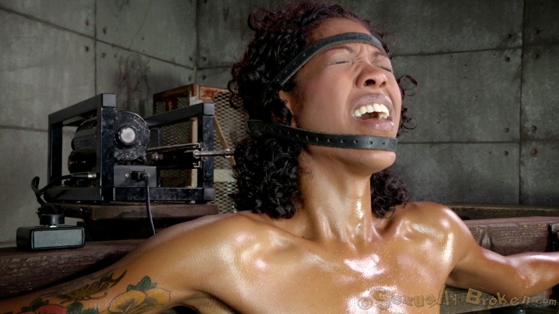 Awesome oiled ebony and a white cock in her mouth