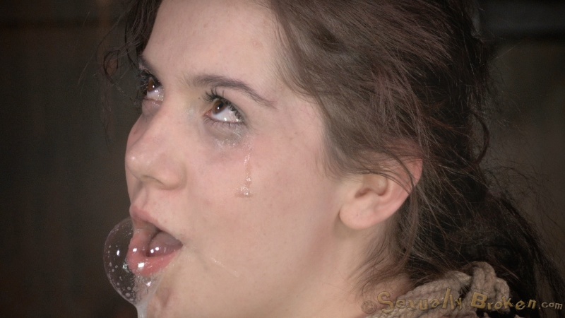 Blindfolded teen in blue dress sucks a dick with tied hands