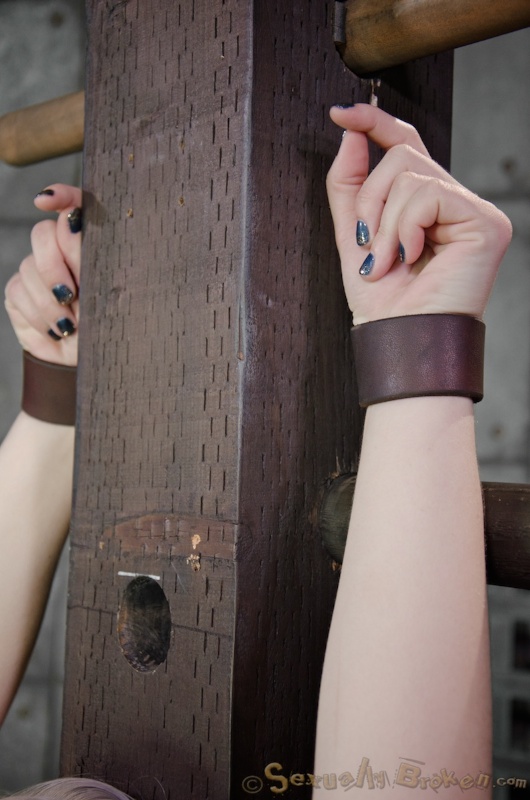 Leggy cuffed blonde gets her face fucked