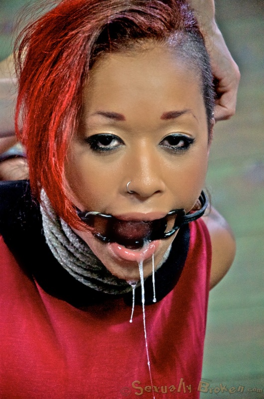 Redhead ebony slut gets her mouth fucked