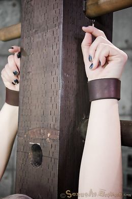 Leggy cuffed blonde gets her face fucked